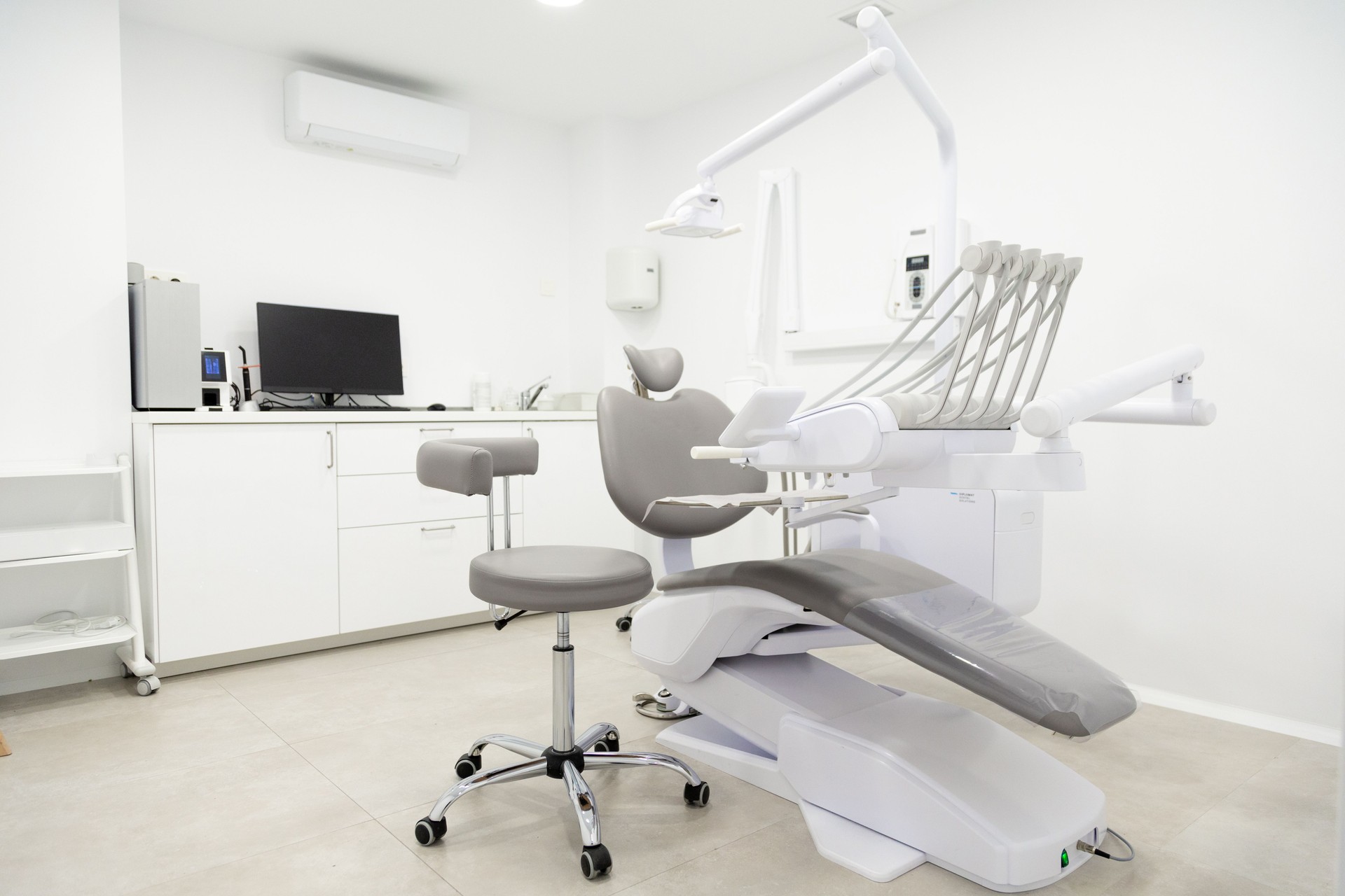 Modern dental office with empty chair and equipment waiting for patients